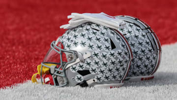 Nov 4, 2023; Piscataway, New Jersey, USA; Ohio State Buckeyes helmets rest on the field before the