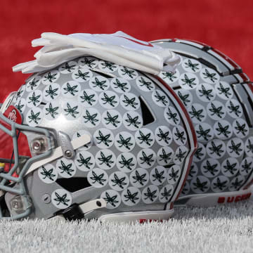 Nov 4, 2023; Piscataway, New Jersey, USA; Ohio State Buckeyes helmets rest on the field before the game against the Rutgers Scarlet Knights at SHI Stadium. Mandatory Credit: Vincent Carchietta-USA TODAY Sports