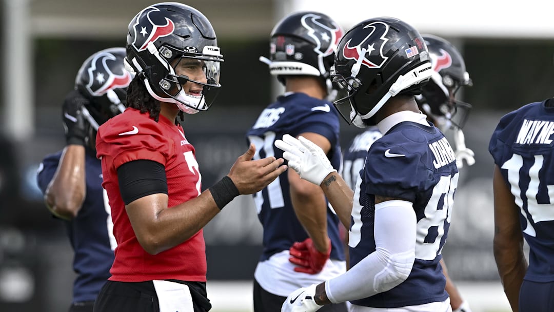 Jun 10, 2025; Houston, TX, USA; Houston Texans quarterback C.J. Stroud (7) and wide receiver Xavier Johnson (89) interact during an NFL football minicamp at NRG Stadium. Mandatory Credit: Maria Lysaker-Imagn Images 