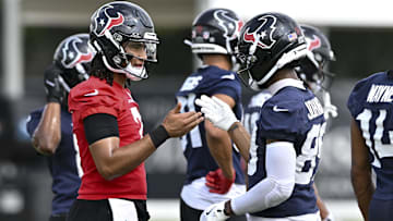 Jun 10, 2025; Houston, TX, USA; Houston Texans quarterback C.J. Stroud (7) and wide receiver Xavier Johnson (89) interact during an NFL football minicamp at NRG Stadium. Mandatory Credit: Maria Lysaker-Imagn Images 