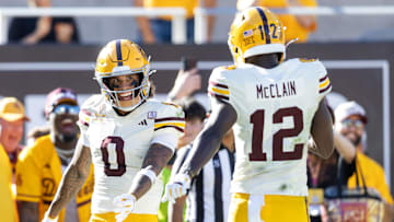 Oct 18, 2025; Tempe, Arizona, USA; Arizona State Sun Devils wide receiver Jordyn Tyson (0) celebrates a touchdown with teammate Malik McClain (12) against the Texas Tech Red Raiders in the second half at Mountain America Stadium. Mandatory Credit: Mark J. Rebilas-Imagn Images