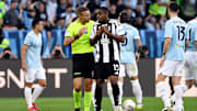 Pierre Kalulu of Juventus FC talks with referee Davide Massa...