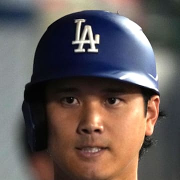 Los Angeles Dodgers designated hitter Shohei Ohtani (17) celebrates with teammates after hitting a home run in the eighth inning against the Los Angeles Angels at Angel Stadium on Aug. 11. 