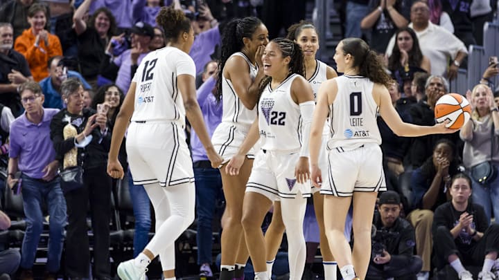 Sep 4, 2025; San Francisco, California, USA;  Golden State Valkyries guard Veronica Burton (22) is congratulated by center Iliana Rupert (12) and guard Carla Leite (0) after she scored against the Dallas Wings during the second half at Chase Center. Mandatory Credit: John Hefti-Imagn Images