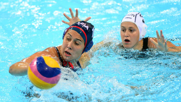 United States center forward Annika Dries (11) is chased by Hungary center forward Dora Czigany 