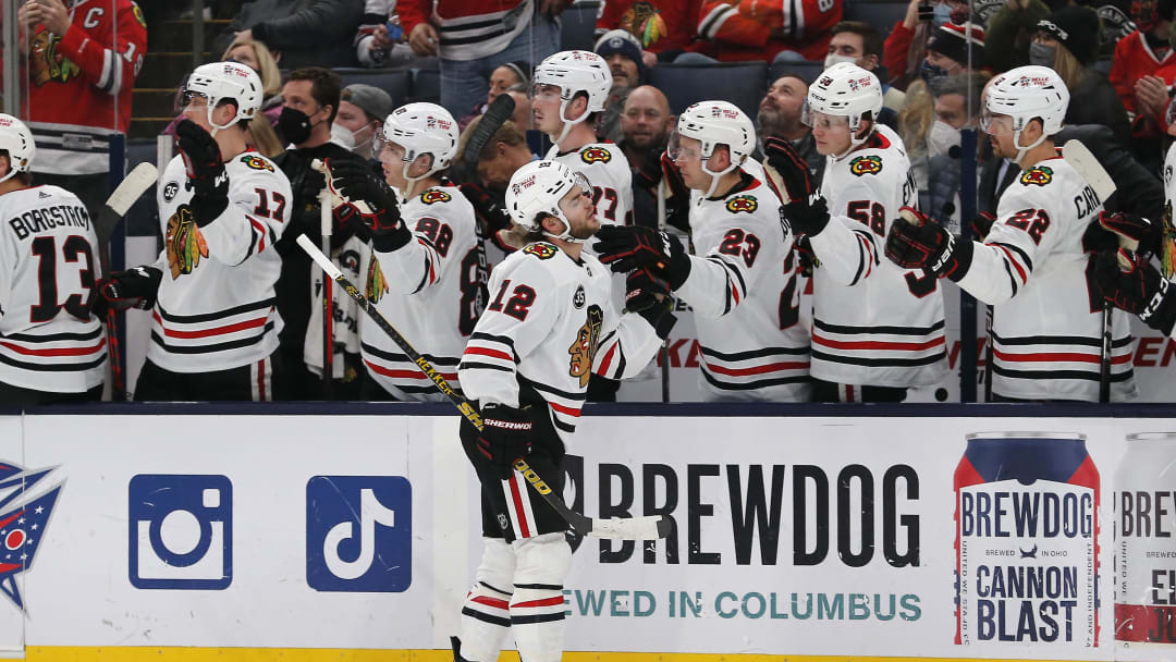 Jan 11, 2022; Columbus, Ohio, USA; Chicago Blackhawks right wing Alex DeBrincat (12) celebrates a