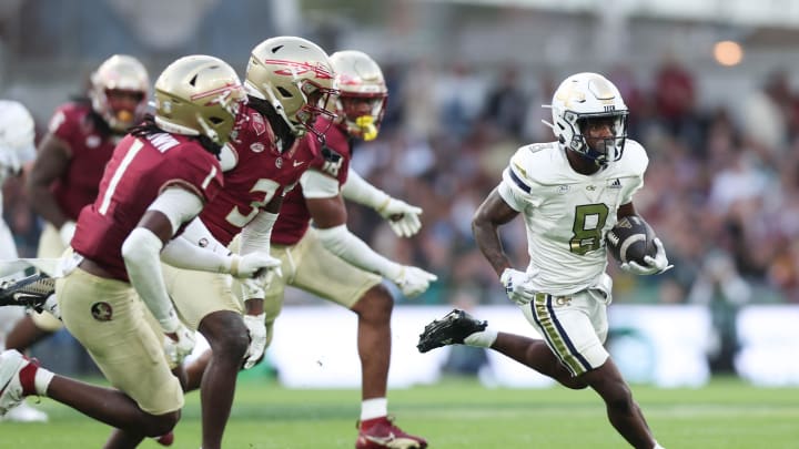 Aug 24, 2024; Dublin, IRL; Georgia Tech wide receiver Malik Rutherford runs with the ball against Florida State at Aviva Stadium. Mandatory Credit: Tom Maher/INPHO via USA TODAY Sports