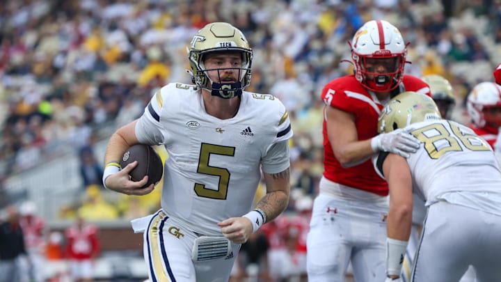 Sep 14, 2024; Atlanta, Georgia, USA; Georgia Tech Yellow Jackets quarterback Zach Pyron (5) runs the ball for a touchdown against the Virginia Military Institute Keydets in the second quarter at Bobby Dodd Stadium at Hyundai Field. Mandatory Credit: Brett Davis-Imagn Images