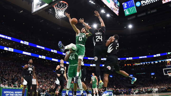 Dec 29, 2022; Boston, Massachusetts, USA; Boston Celtics forward Jayson Tatum (0) is fouled by LA