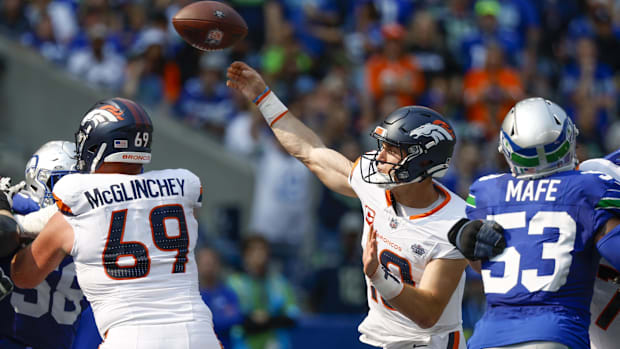 Denver Broncos quarterback Bo Nix (10) passes against the Seattle Seahawks during the second quarter at Lumen Field. 