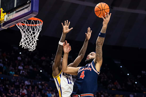 Jan 29, 2025; Baton Rouge, Louisiana, USA;  Auburn Tigers forward Johni Broome (4) misses a jump shot against LSU Tigers.