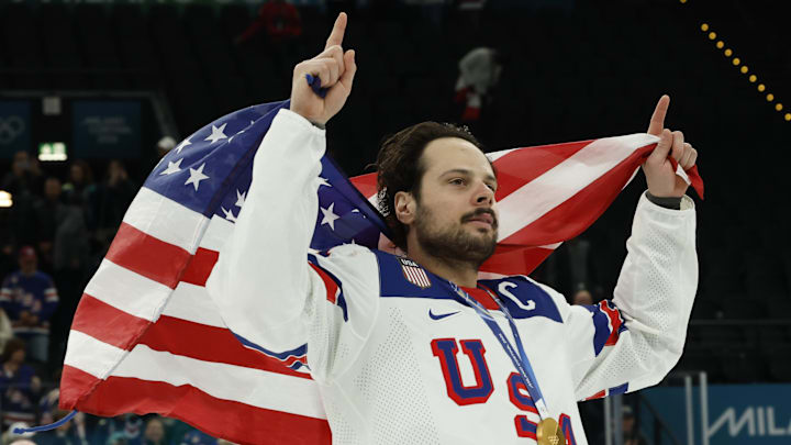 Feb 22, 2026; Milan, Italy; Auston Matthews #34 of Team United States celebrates after the game against Team Canada during the Milano Cortina 2026 Olympic Winter Games at Milano Santagiulia Ice Hockey Arena. Mandatory Credit: Geoff Burke-Imagn Images