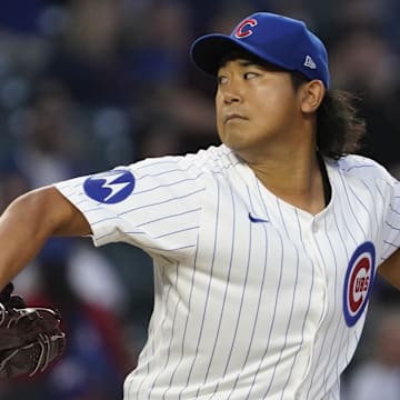 Sep 16, 2024; Chicago, Illinois, USA; Chicago Cubs pitcher Shota Imanaga (18) throws the ball against the Oakland Athletics during the first inning at Wrigley Field. 