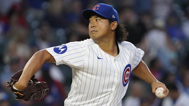 Sep 16, 2024; Chicago, Illinois, USA; Chicago Cubs pitcher Shota Imanaga (18) throws the ball against the Oakland Athletics during the first inning at Wrigley Field. 