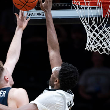 Virginia forward Thijs De Ridder (28) has his shot blocked by Vanderbilt center Jalen Washington (13) during the second half of their exhibition game at Memorial Gym in Nashville, Tenn., Thursday, Oct. 16, 2025.