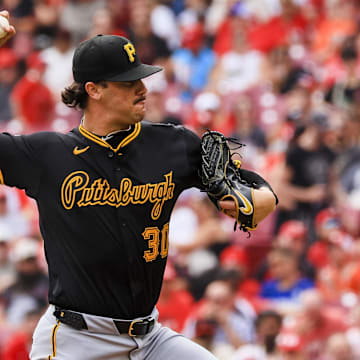 Sep 22, 2024; Cincinnati, Ohio, USA; Pittsburgh Pirates starting pitcher Paul Skenes (30) pitches against the Cincinnati Reds in the first inning at Great American Ball Park. Mandatory Credit: Katie Stratman-Imagn Images