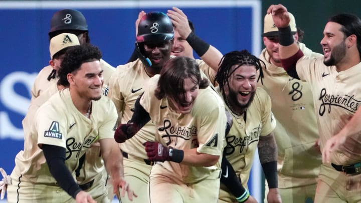 Aug 13, 2024; Phoenix, Arizona, USA; Arizona Diamondbacks outfielder Jake McCarthy (31) celebrates with teammates after hitting a two RBI walk off single against the Colorado Rockies during the ninth inning at Chase Field. Mandatory Credit: Joe Camporeale-USA TODAY Sports