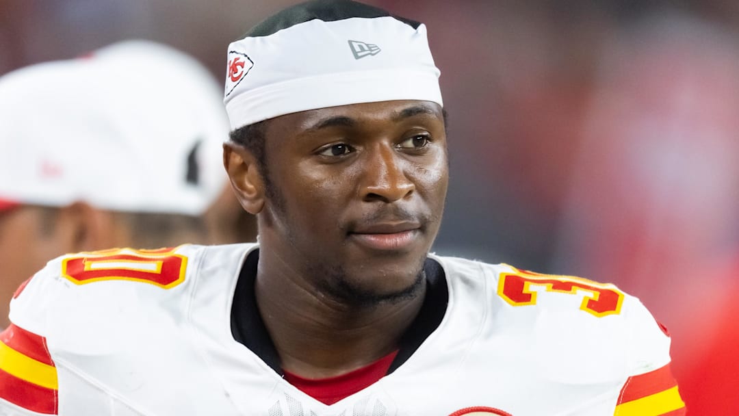 Aug 9, 2025; Glendale, Arizona, USA; Kansas City Chiefs running back Brashard Smith (30) against the Arizona Cardinals during a preseason NFL game at State Farm Stadium.