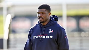 Jul 25, 2019; Houston, TX, USA; Special advisor to head coach Andre Johnson walks on the field before the start of training camp at Houston Methodist Training Center. Mandatory Credit: Troy Taormina-Imagn Images