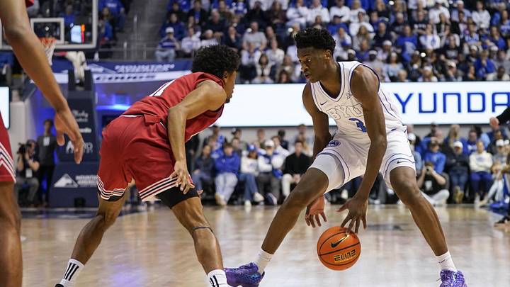 Mar 7, 2026; Provo, Utah, USA; BYU Cougars forward AJ Dybantsa (3) dribbles the ball while being defended by Texas Tech Red Raiders guard Jaylen Petty (11) during the first half at Marriott Center. Mandatory Credit: Aaron Baker-Imagn Images 