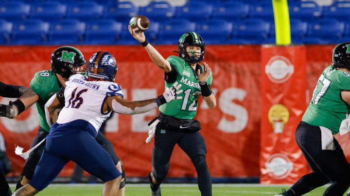 Dec 19, 2023; Frisco, TX, USA; Marshall Thundering Herd quarterback Cole Pennington (12) throws a pass during the fourth quarter against the UTSA Roadrunners at Toyota Stadium. Mandatory Credit: Andrew Dieb-USA TODAY Sports