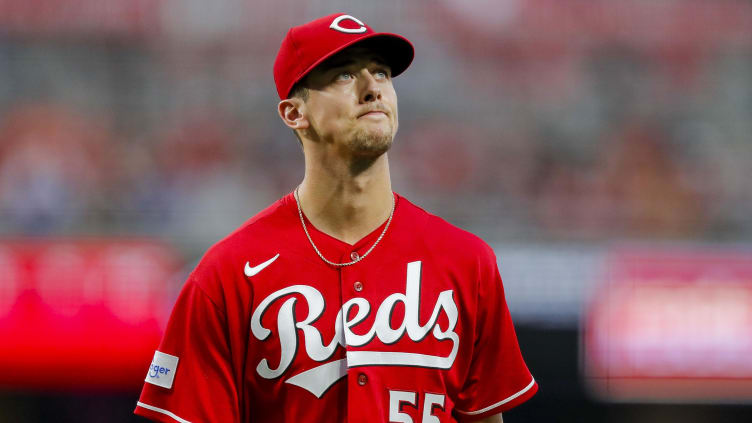 Cincinnati Reds starting pitcher Brandon Williamson (55), Nick Martinez