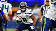 Nov 16, 2025; Inglewood, California, USA; Seattle Seahawks running back Kenneth Walker III (9) runs the ball during the first half against the Los Angeles Rams at SoFi Stadium.