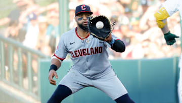 Jun 20, 2025; West Sacramento, California, USA; Cleveland Guardians first base Carlos Santana (41) records an out during the game against the Athletics at Sutter Health Park. Mandatory Credit: Sergio Estrada-Imagn Images