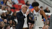 Mar 21, 2025; Raleigh, NC, USA;  Connecticut Huskies head coach Dan Hurley talks with forward Jaylin Stewart (3) during the second half against the Oklahoma Sooners at Lenovo Center. Mandatory Credit: Zachary Taft-Imagn Images