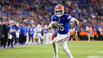Sep 14, 2024; Gainesville, Florida, USA; Florida Gators quarterback Graham Mertz (15) rushes with the ball against the Texas A&M Aggies during the second half at Ben Hill Griffin Stadium. Mandatory Credit: Matt Pendleton-Imagn Images