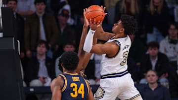 Feb 15, 2025; Atlanta, Georgia, USA; Georgia Tech Yellow Jackets guard Jaeden Mustaf (3) shoots against the California Golden Bears in the first half at McCamish Pavilion. Mandatory Credit: Brett Davis-Imagn Images