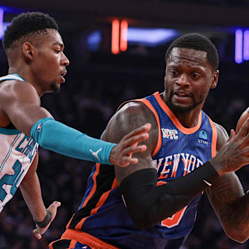 Nov 28, 2023; New York, New York, USA; New York Knicks forward Julius Randle (30) is defended by Charlotte Hornets forward Brandon Miller (24) during the first quarter at Madison Square Garden. Mandatory Credit: Vincent Carchietta-Imagn Images