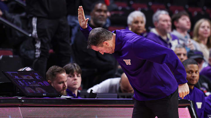 Feb 24, 2026; Piscataway, New Jersey, USA; Washington Huskies head coach Danny Sprinkle slaps the scorers table during the second half against the Rutgers Scarlet Knights at Jersey Mike's Arena. Mandatory Credit: Vincent Carchietta-Imagn Images