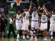 Celtics forward Kevin Garnett and guard Ray Allen high five teammates forward Paul Pierce and guard Rajon Rondo during a playoff run.