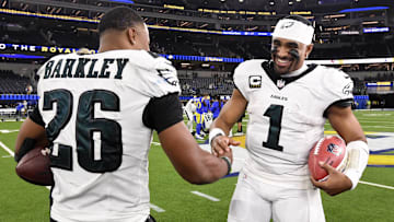 Jalen Hurts celebrates with Saquon Barkley after the Eagles defeat the Los Angeles Rams.