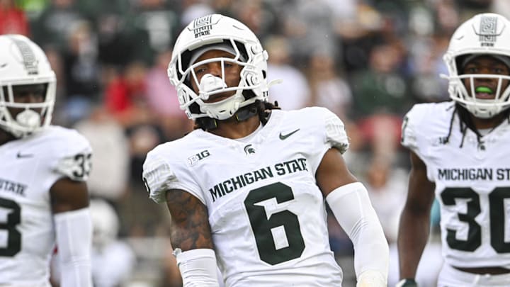 Sep 7, 2024; College Park, Maryland, USA; Michigan State Spartans defensive back Ade Willie (6) reacts after tackling Maryland Terrapins wide receiver Braeden Wisloski (19) on a first half kickoff return at SECU Stadium. Mandatory Credit: Tommy Gilligan-Imagn Images Sep 7, 2024; College Park, Maryland, USA; Michigan State Spartans defensive back Ade Willie (6) reacts after tackling Maryland Terrapins wide receiver Braeden Wisloski (19) on a first half kickoff return at SECU Stadium. Mandatory Credit: Tommy Gilligan-Imagn Images