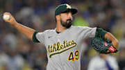 May 15, 2025; Los Angeles, California, USA; Athletics pitcher Jason Alexander (49) throws a pitch against the Los Angeles Dodgers during the second inning of the game at Dodger Stadium.