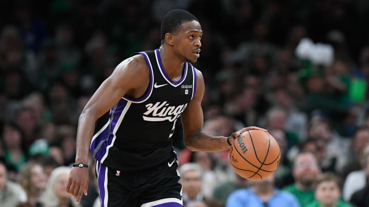 Apr 5, 2024; Boston, Massachusetts, USA; Sacramento Kings guard De'Aaron Fox (5) dribbles the ball against the Boston Celtics during the second half at TD Garden. Mandatory Credit: Eric Canha-USA TODAY Sports