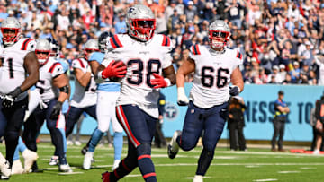 Oct 19, 2025; Nashville, Tennessee, USA; New England Patriots running back Rhamondre Stevenson (38) scores a touchdown against the Tennessee Titans during the second half at Nissan Stadium. Mandatory Credit: Steve Roberts-Imagn Images