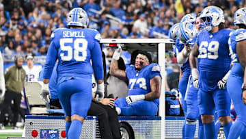 Nov 2, 2025; Detroit, Michigan, USA; Detroit Lions offensive lineman Christian Mahogany (73) is carted out of the field in the fourth quarter against the Minnesota Vikings at Ford Field. Mandatory Credit: Lon Horwedel-Imagn Images