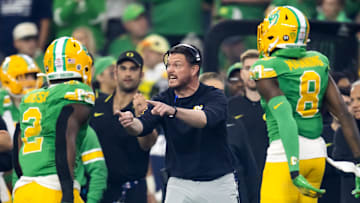 Jan 1, 2024; Glendale, AZ, USA; Oregon Ducks head coach Dan Lanning during the 2024 Fiesta Bowl against the Liberty Flames at State Farm Stadium. Mandatory Credit: Mark J. Rebilas-USA TODAY Sports