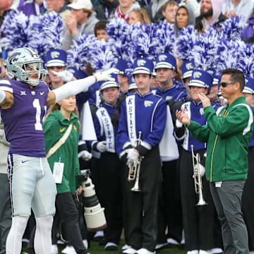 Nov 11, 2023; Manhattan, Kansas, USA; Kansas State Wildcats cornerback Keenan Garber (1) celebrates a fourth down stop during the second quarter against the Baylor Bears at Bill Snyder Family Football Stadium. Mandatory Credit: Scott Sewell-Imagn Images