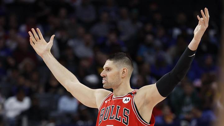 Feb 2, 2025; Detroit, Michigan, USA; Chicago Bulls center Nikola Vucevic (9) reacts in the first half against the Detroit Pistons at Little Caesars Arena. Mandatory Credit: Rick Osentoski-Imagn Images