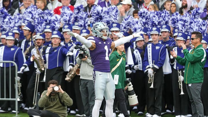 Nov 11, 2023; Manhattan, Kansas, USA; Kansas State Wildcats cornerback Keenan Garber (1) celebrates a fourth down stop during the second quarter against the Baylor Bears at Bill Snyder Family Football Stadium. Mandatory Credit: Scott Sewell-Imagn Images