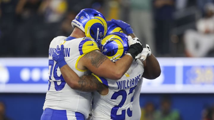 Dec 3, 2023; Inglewood, California, USA; Los Angeles Rams offensive linesmen Rob Havenstein (79) Los Angeles Rams running back Kyren Williams (23) and Los Angeles Rams offensive linesmen Steve Avila (73) celebrate during the second half in a game against the Cleveland Browns at SoFi Stadium. Mandatory Credit: Yannick Peterhans-Imagn Images