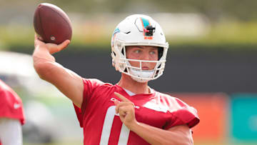 Jul 28, 2025; Miami Gardens, MI, USA; Miami Dolphins quarterback Zach Wilson (0) throws the football during training camp at Baptist Health Training Complex. Mandatory Credit: Sam Navarro-Imagn Images