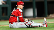 Aug 27, 2025; Arlington, Texas, USA;  Los Angeles Angels catcher Logan O'Hoppe (14) reacts after throwing the ball to first base during the third inning against the Texas Rangers at Globe Life Field. Mandatory Credit: Kevin Jairaj-Imagn Images