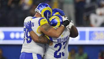 Dec 3, 2023; Inglewood, California, USA; Los Angeles Rams offensive linesmen Rob Havenstein (79) Los Angeles Rams running back Kyren Williams (23) and Los Angeles Rams offensive linesmen Steve Avila (73) celebrate during the second half in a game against the Cleveland Browns at SoFi Stadium. Mandatory Credit: Yannick Peterhans-Imagn Images