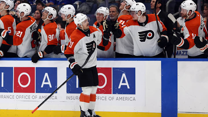 Nov 7, 2024; Tampa, Florida, USA; Philadelphia Flyers right wing Travis Konecny (11) celebrates after a goal during the overtime shootout against the Tampa Bay Lightning at Amalie Arena. Mandatory Credit: Kim Klement Neitzel-Imagn Images
