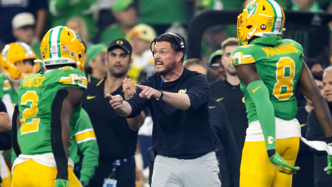 Jan 1, 2024; Glendale, AZ, USA; Oregon Ducks head coach Dan Lanning during the 2024 Fiesta Bowl against the Liberty Flames at State Farm Stadium. Mandatory Credit: Mark J. Rebilas-USA TODAY Sports